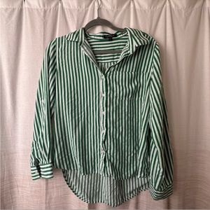On trend this spring! Green & white striped collared shirt. Great used item.